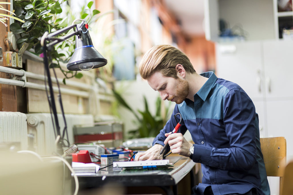 Man working on a circuit board