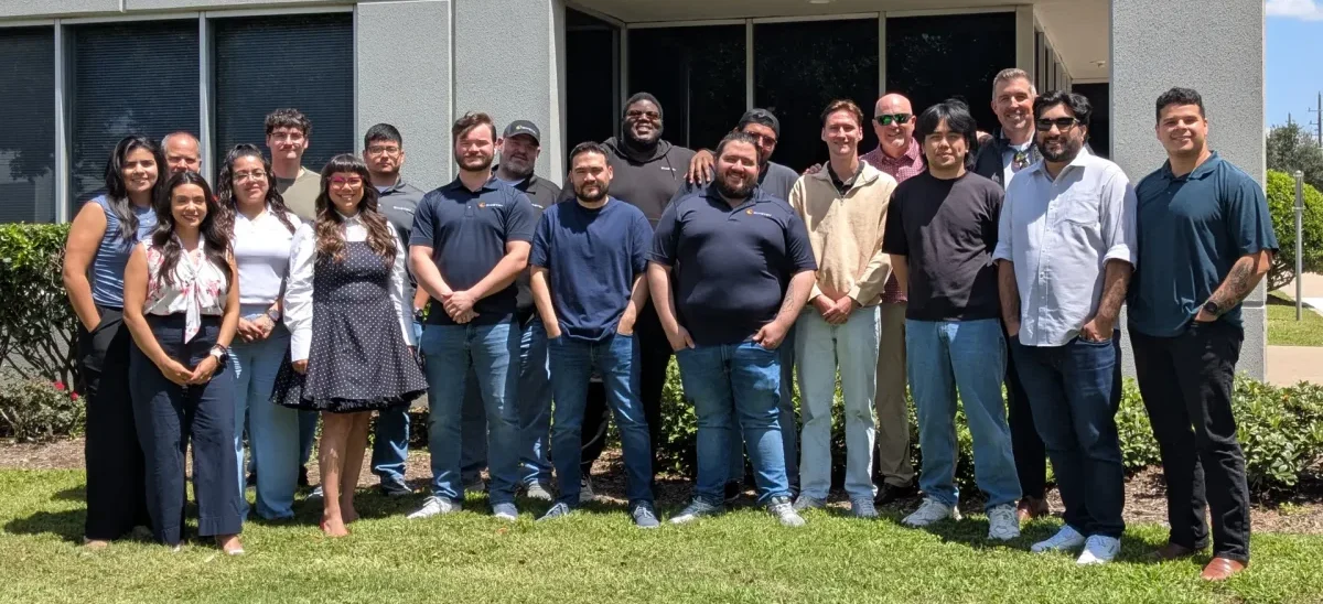 SIMETRY group shot in front of office
